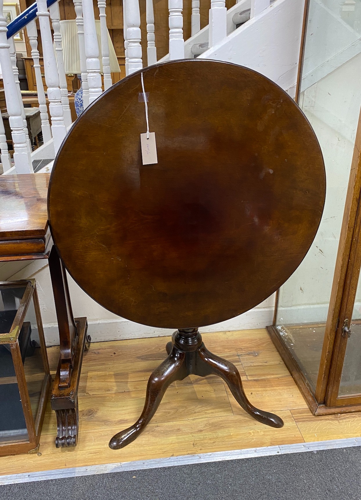A George III mahogany tilt-top tripod table, diameter 72cm